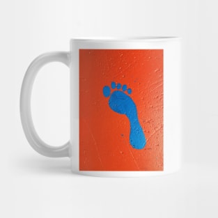 BLUE FOOTPRINT UP THE WALL Mug